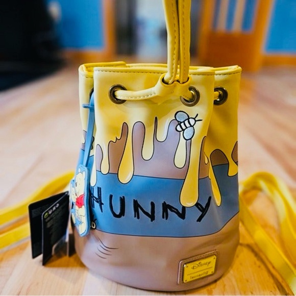 Loungefly Handbags - Loungefly Winnie the Pooh 95th Anniversary Honey Pot convertible backpack/purse.